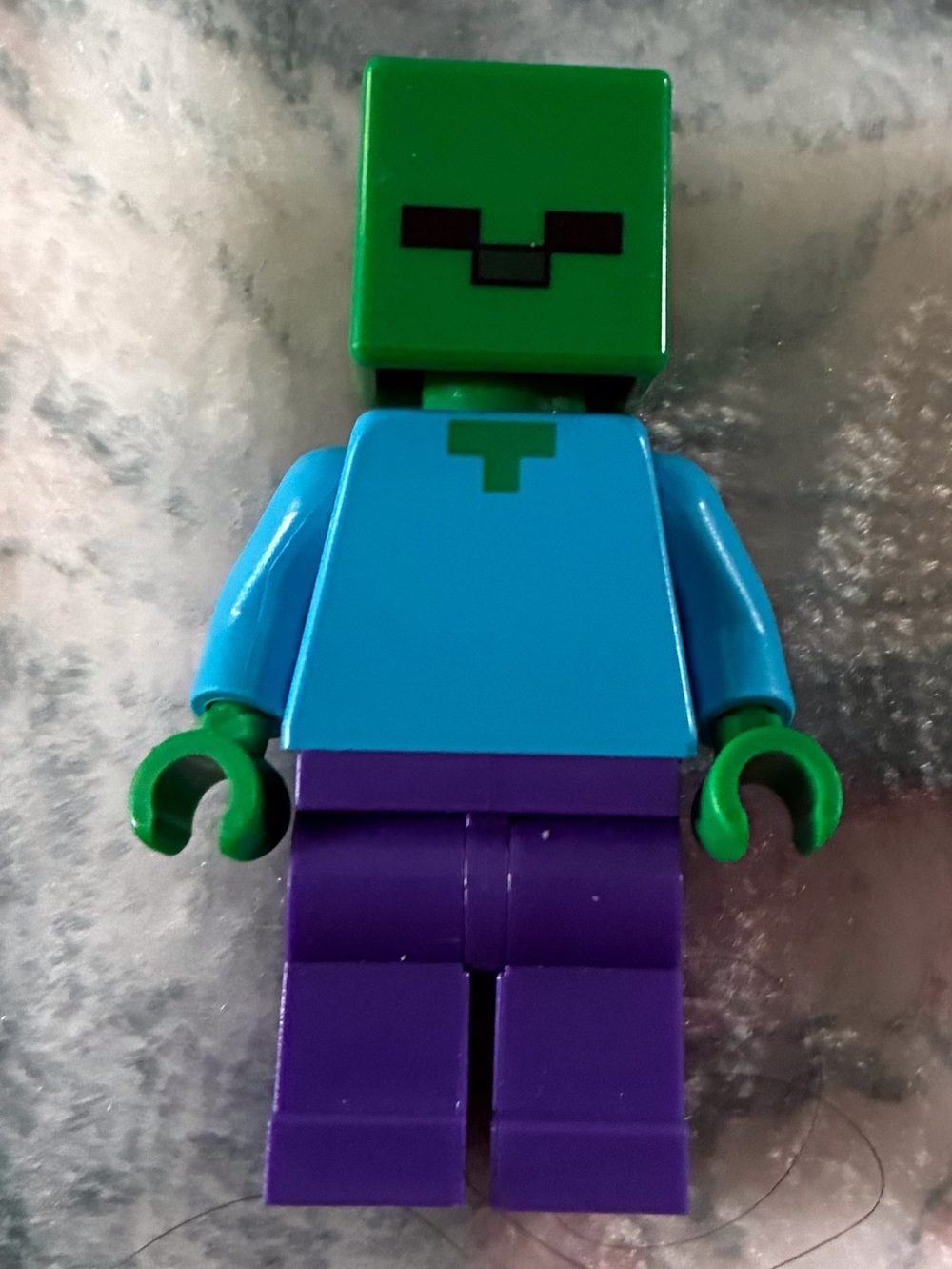Green-Head Figure with Teal Torso & Purple Legs
